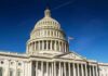 Deficit Bombshell Rattles Washington United States Capitol dome against clear blue sky