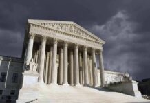 U.S. Leverage Sparks Bolsonaro Arrest Bombshell United States Supreme Court building with columns under stormy sky