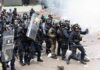 France’s School Meltdown Sparks Street Chaos Dontrelle Inman and Tom Mandrake among riot police advancing with shields in tear gas