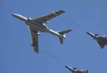 Warplanes Shadow Massive U.S.-Japan Wargame Aerial refueling with a large tanker and two fighter jets in flight