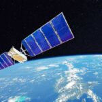 Stealthy Space Maneuver Targets Ukraine Ally Satellite with blue solar panels orbiting Earth