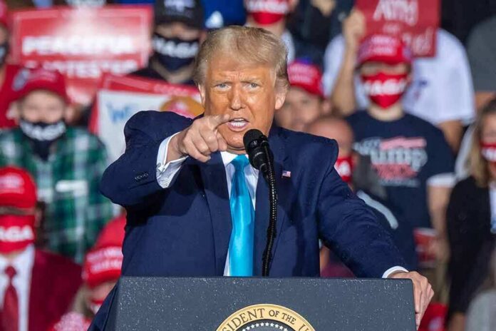 shutterstock_1822427351 speaker pointing during a rally