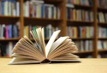 Library Chaos Ends With Pastor Convicted Open book on a table in a library