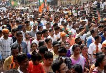 Delhi Detentions Ignite Election Uproar Crowd at a political rally with Kumar Gandharva, Ritu Rani, Jersson Vásquez, Mamata Banerjee, Pravin Amre, Sumrai Tete, Rangana Herath, and Gerson Torres