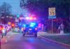 Reporter Targeted? Police Probe Wild Clash Emergency vehicles with flashing lights on a city street at night