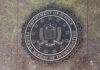 FBI seal mounted on a stone wall