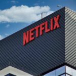 Netflix logo on modern office building exterior