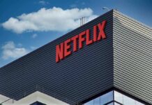 Netflix logo on modern office building exterior