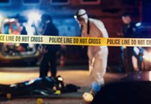 Police tape at nighttime crime scene