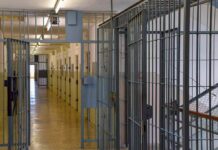 Texas Prepares First Execution Since Pike Failure Prison corridor with barred doors