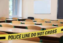 Hero’s Shot Ends Oregon School Carnage Empty classroom with police tape across desks